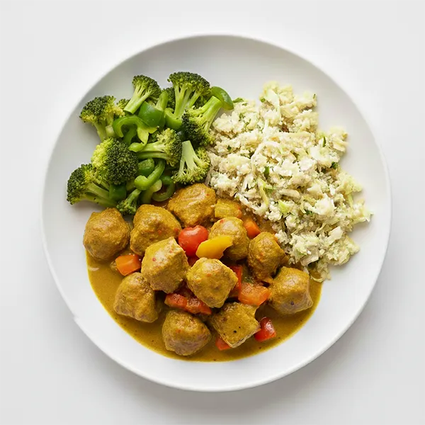 Jamaican Curried Beef with Shreeded Cabbage and Steamed Broccoli